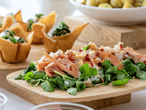 Salmon salad on a wooden board